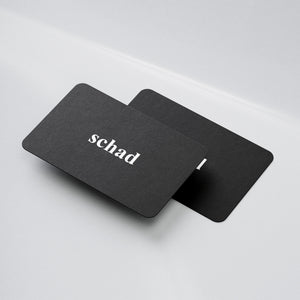 black giftcards with schad logo
